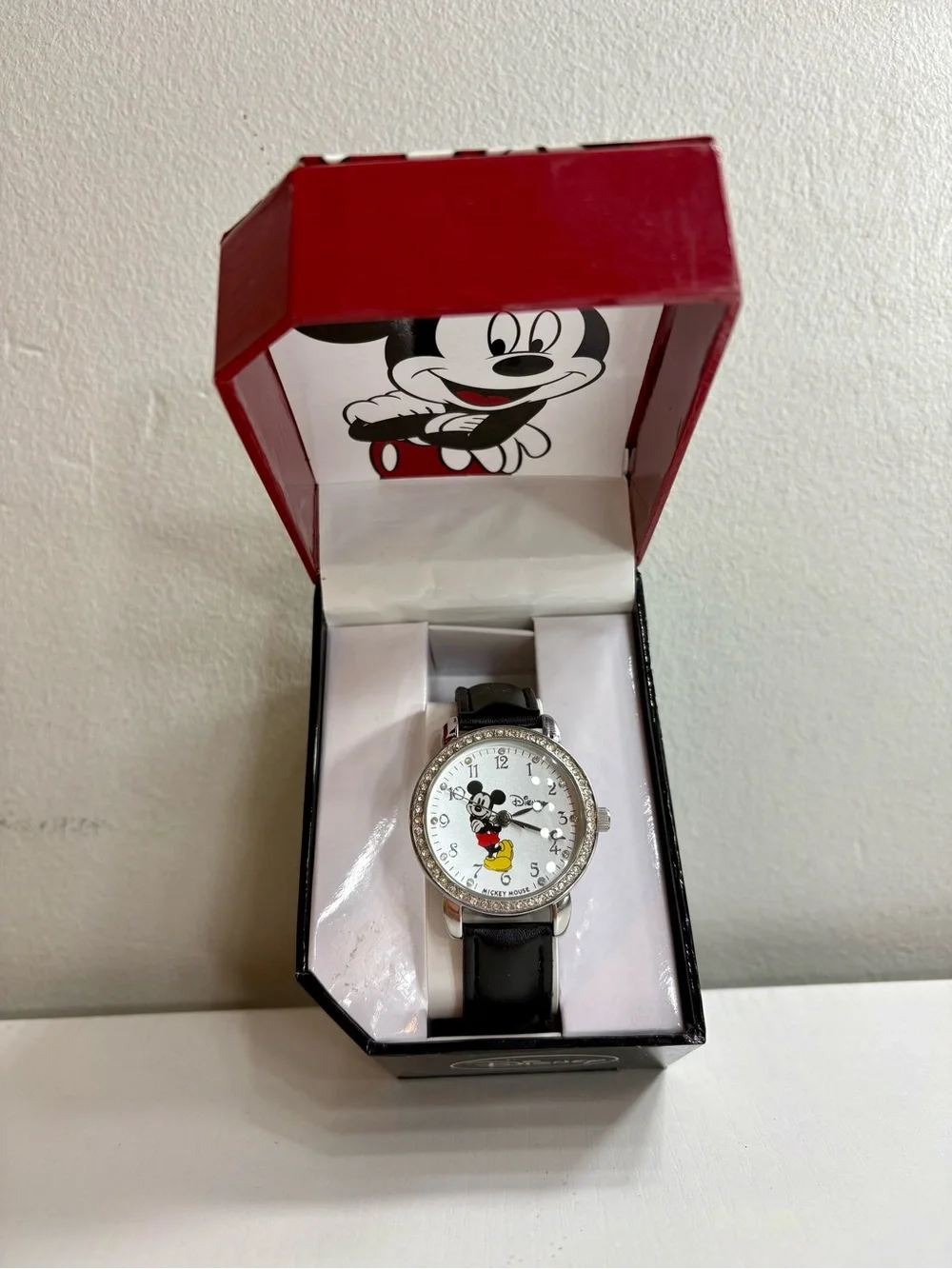 Disney Mickey Mouse Silver-Tone Watch with Black Strap and Red/Yellow Accents